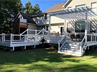 <b>Trex Transcend Pebble Gray Decking with White Washington Vinyl Railing-Black Round Aluminum Balusters-Pergola in Annapolis MD</b>